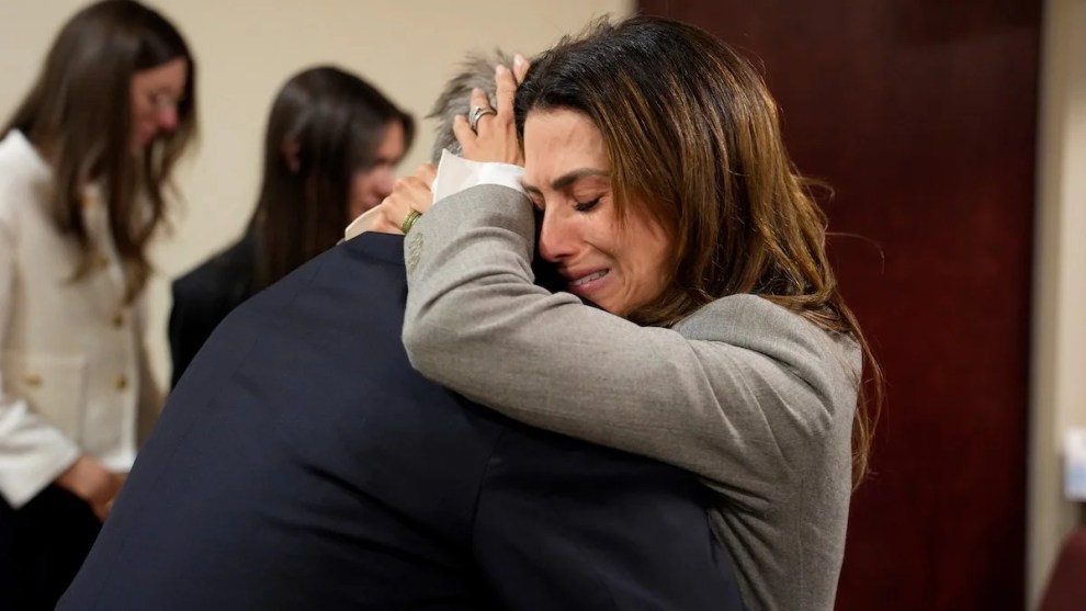 Alec Baldwin and his wife Hilaria Baldwin embrace during his trial for involuntary manslaughter